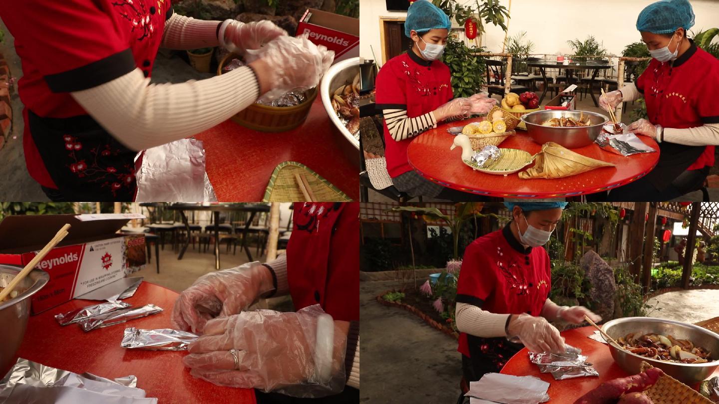 厨师用锡纸包裹土豆玉米鸡蛋制作美食