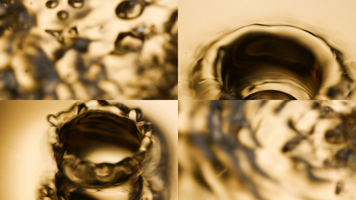 水滴慢镜头，金色水滴水花视频素材