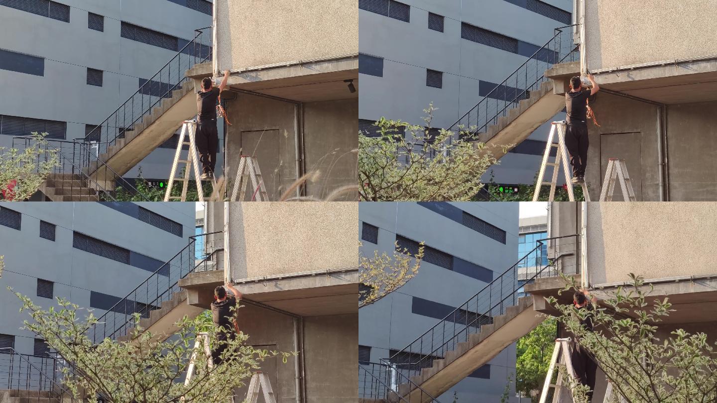 4K工人爬高使用折叠楼梯施工