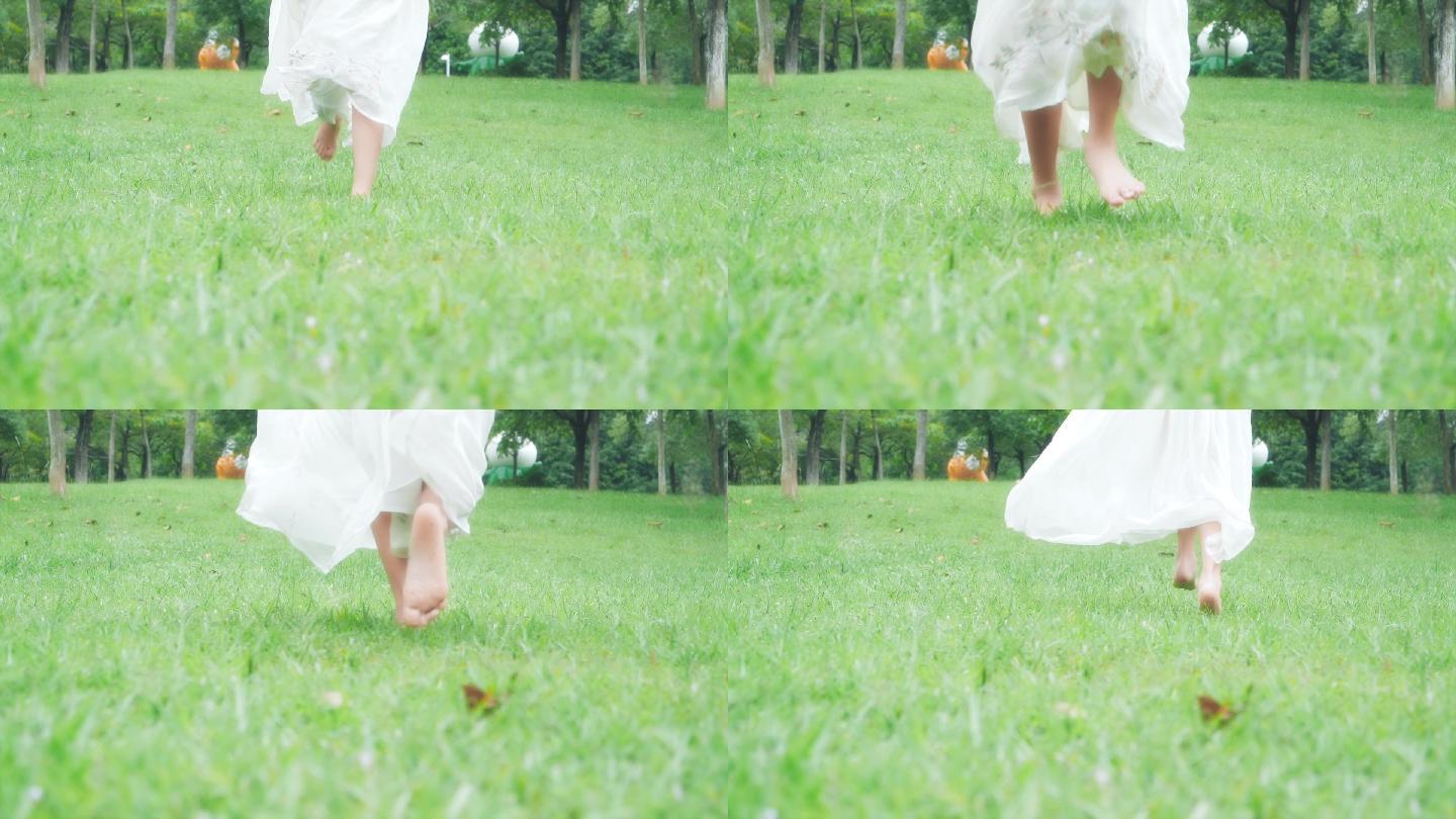 小女孩在草地上奔跑的脚步慢镜头视频素材