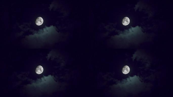 夜晚半月月亮月缺流动的云