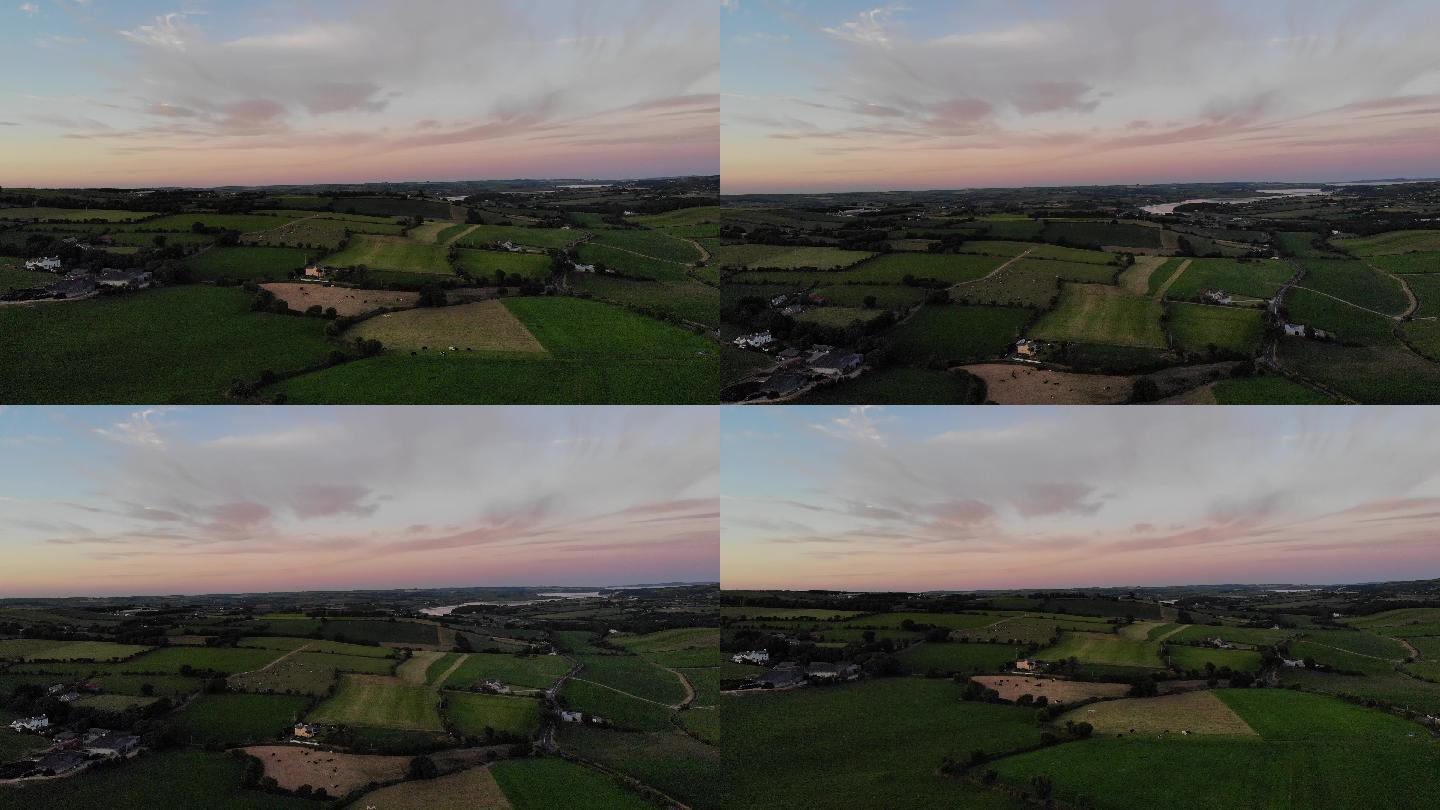 无人机飞行器航拍爱尔兰夕阳下的农田