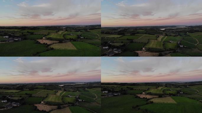 无人机飞行器航拍爱尔兰夕阳下的农田