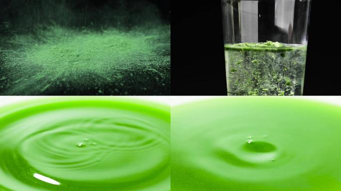 青汁粉倒入水杯绿色粉状和水滴绿色青汁液体