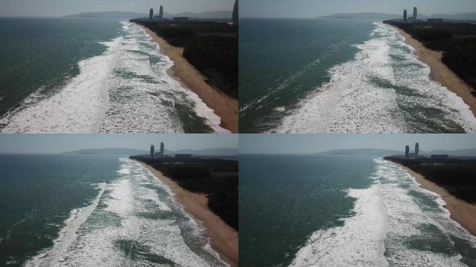 三亚海棠湾浪花沙滩海防林4K航拍