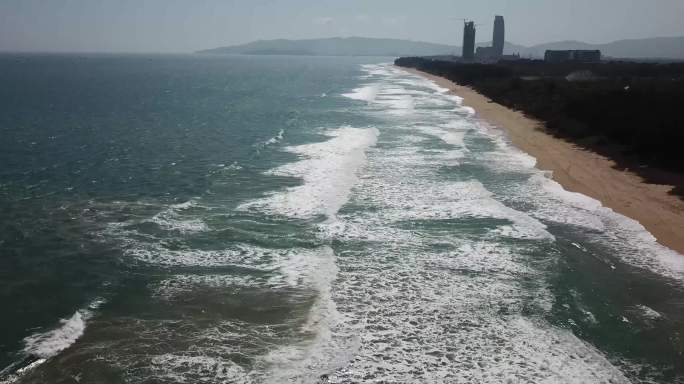 三亚海棠湾海浪沙滩海防林4K航拍