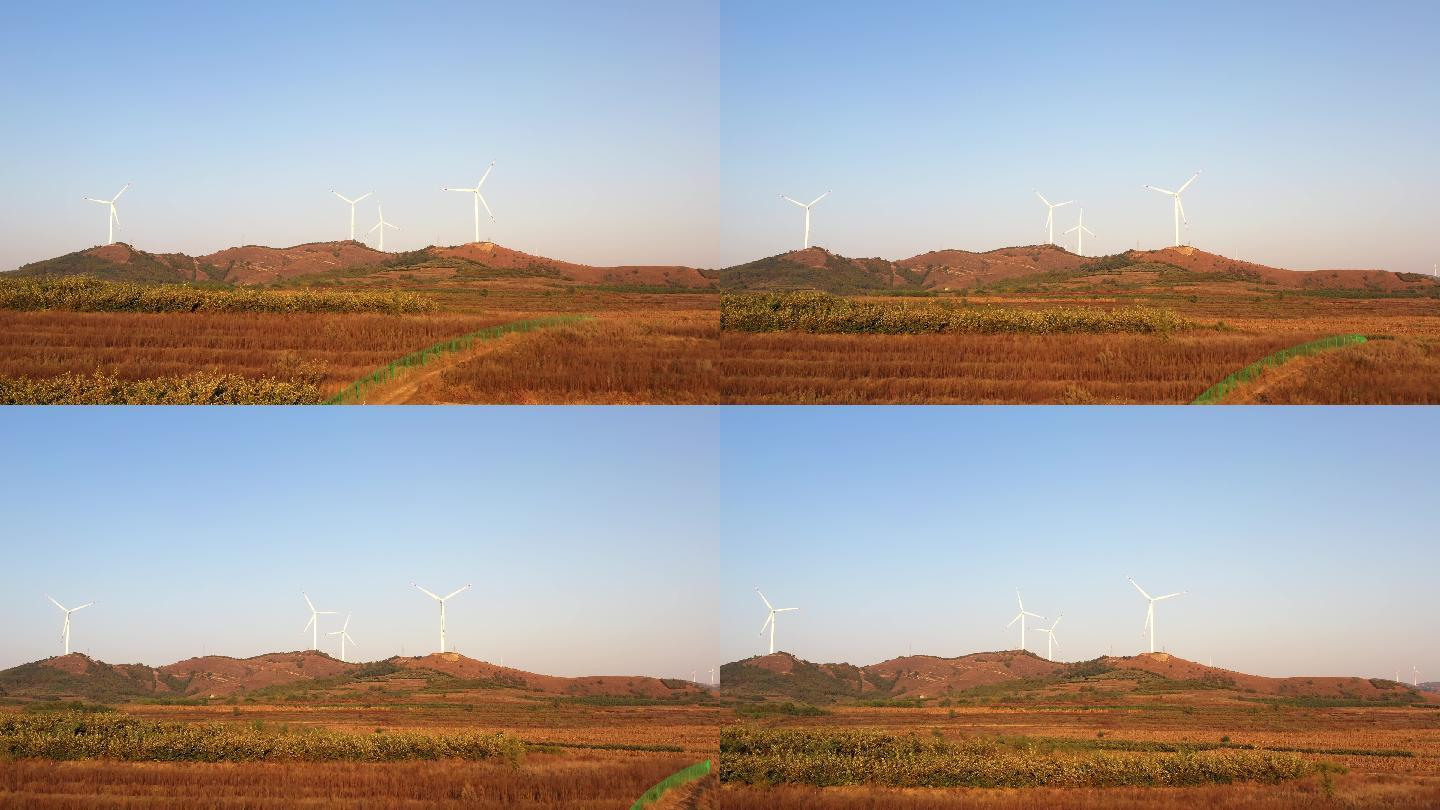 航拍风力发电风车秋季山丘丰收4K