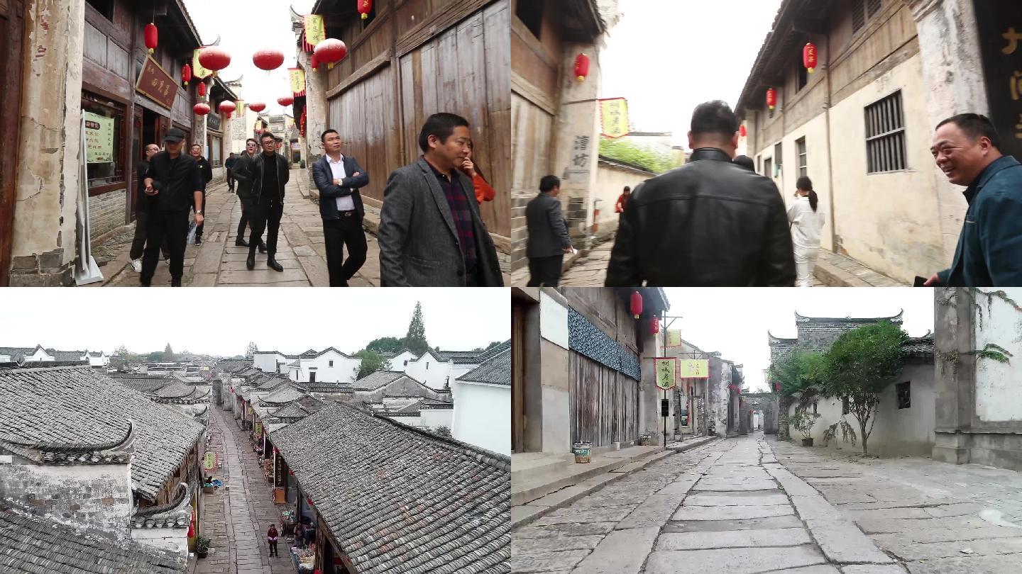 游客游览孔城老街