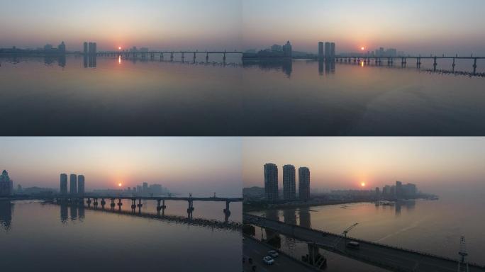 日出飞过飞云江大桥飞向市区
