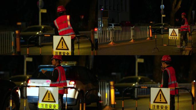 城市建设深圳，夜晚道路维修工人指挥交通