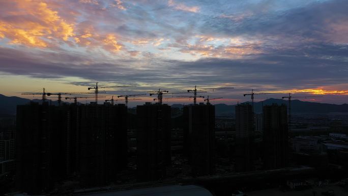 建筑工地夕阳吊车4K实景拍摄