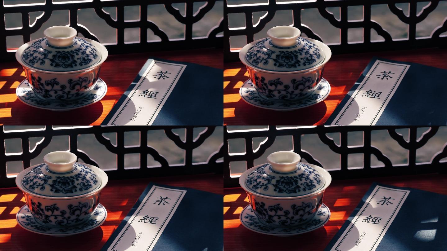 青花瓷茶杯和茶经古籍茶文化中国风