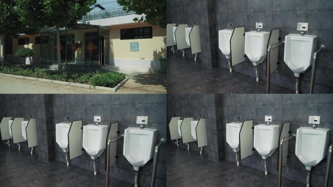 公共厕所的小便池及洗手盆