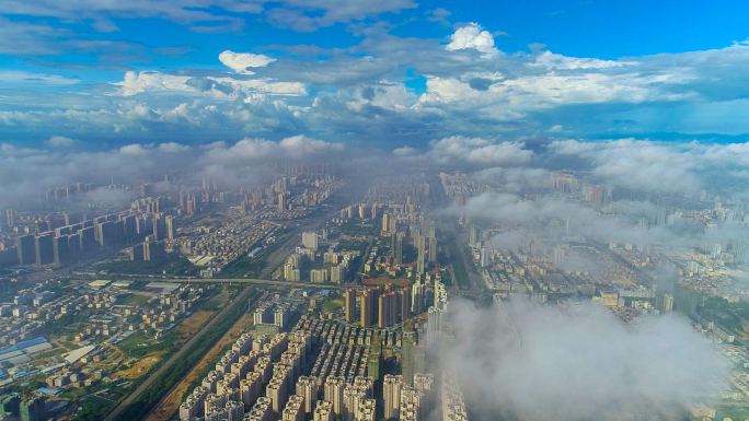 航拍广西北海市城市高空白云穿越视频
