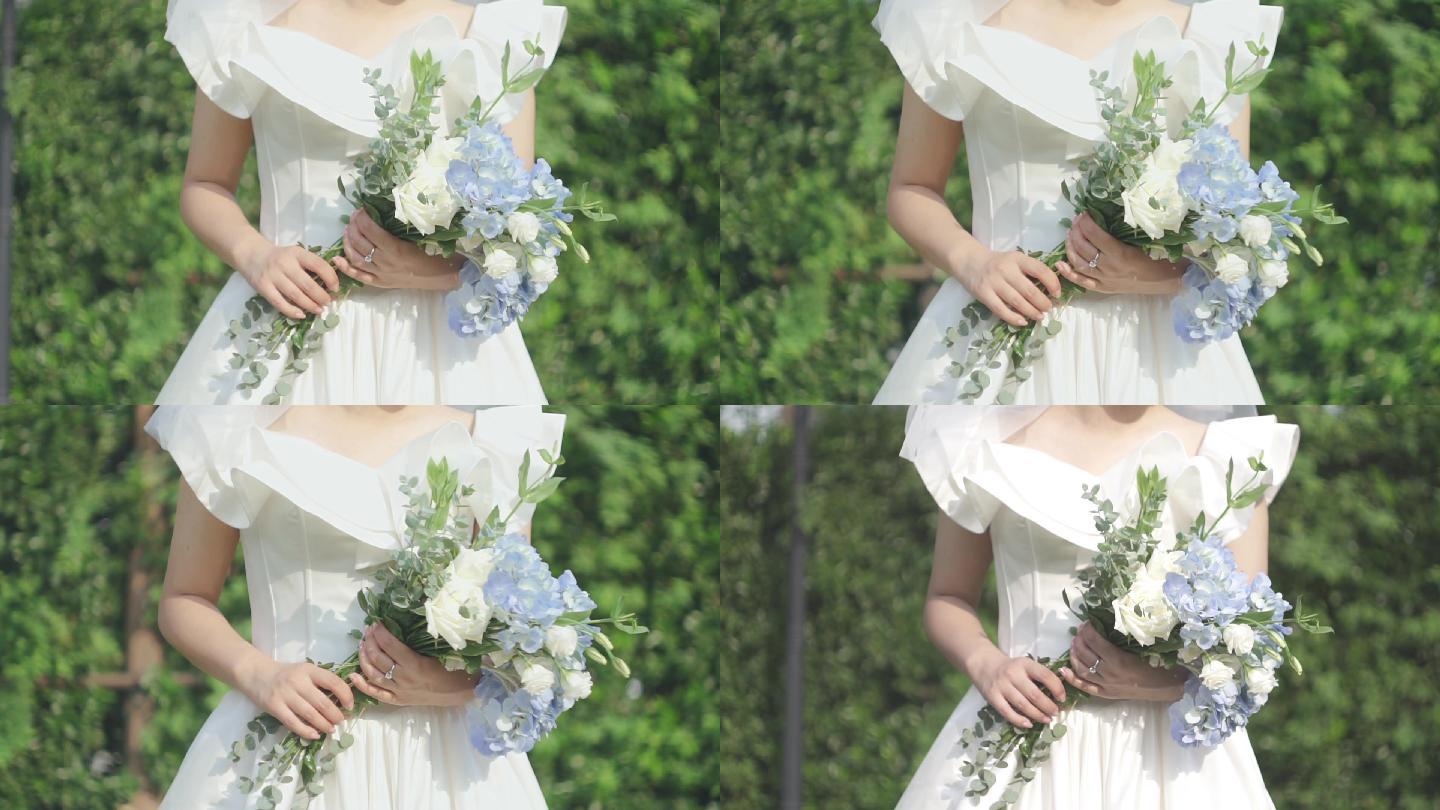 新娘抱着手捧花