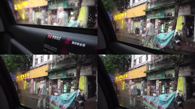 车窗外下雨汽车路边坐车 广东城市街头