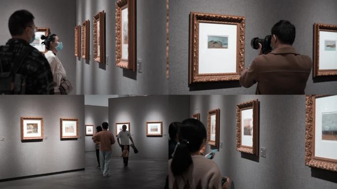 4K参观杨鸣山油画画展的观众