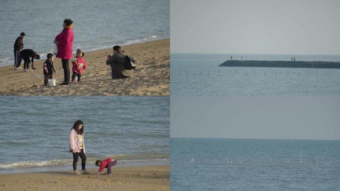 海边游客沙滩赶海