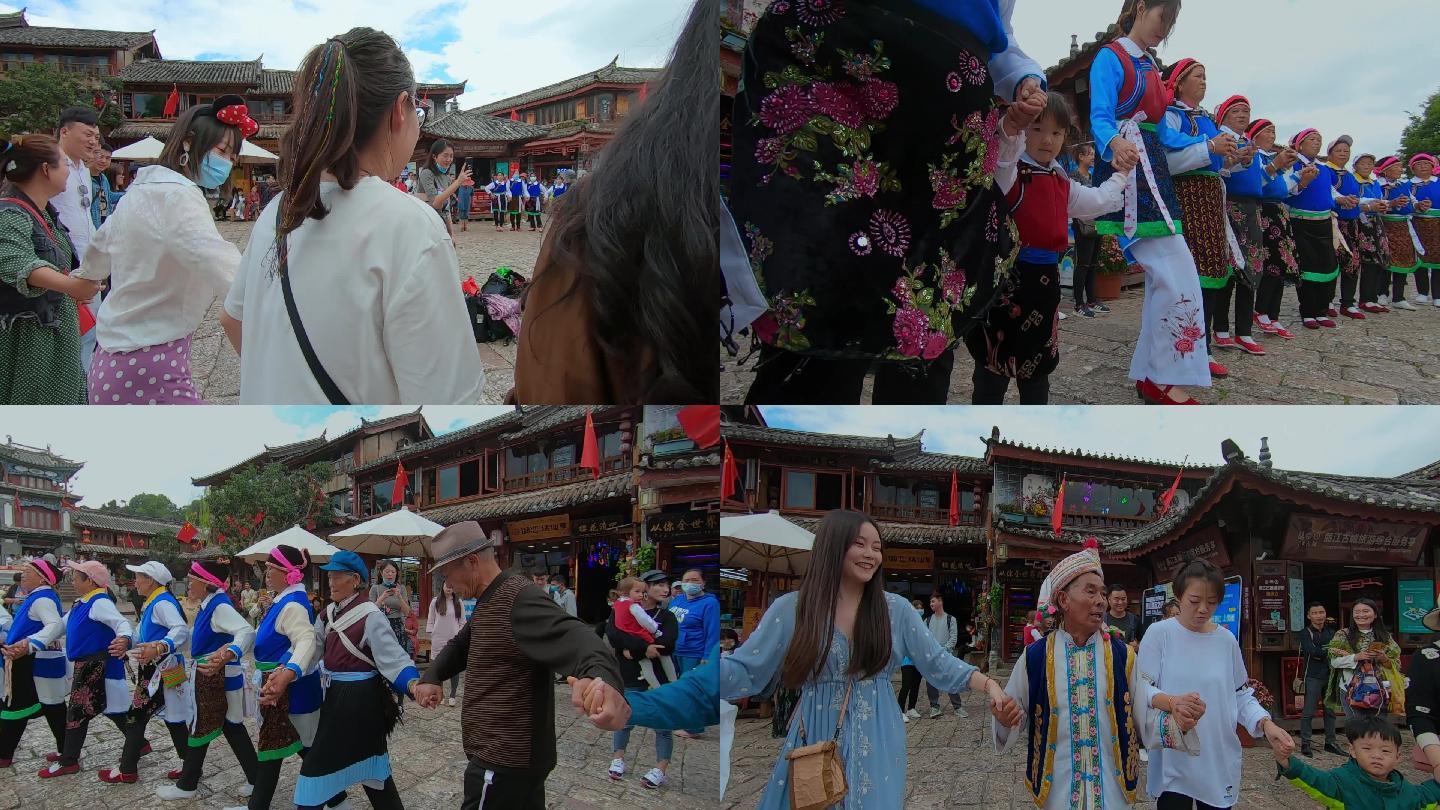 民族舞蹈视频云南丽江古城游客纳西族跳舞