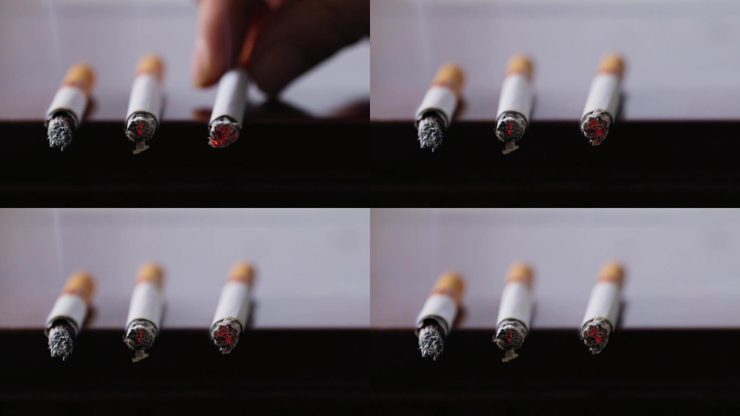 三支燃烧的香烟