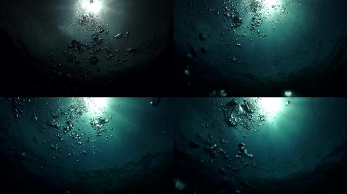 阳光下深海海底水泡缓缓上升