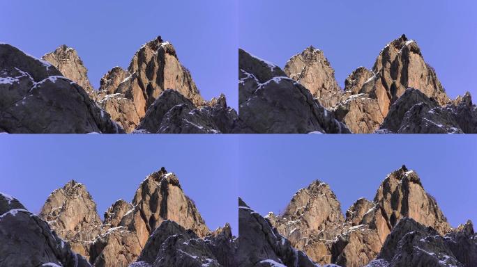 4K雪后贺兰山视差运动镜头岩石山体落雪