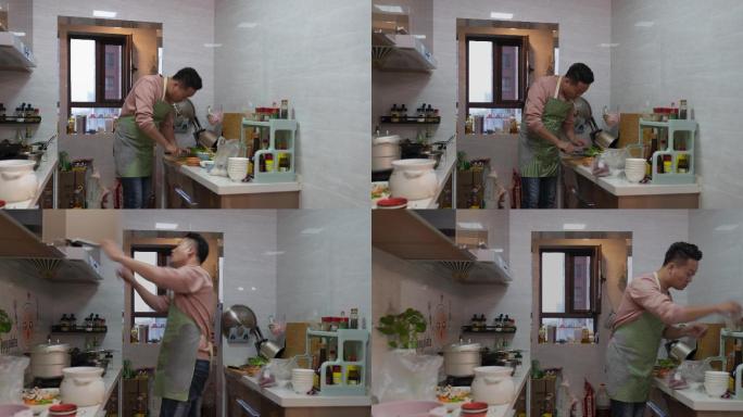 4K家庭厨房中忙碌做饭的男人运动延时