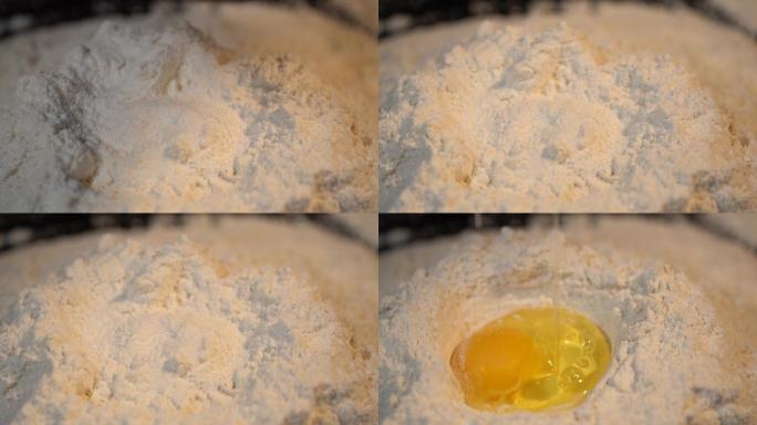 面粉上打鸡蛋实拍素材