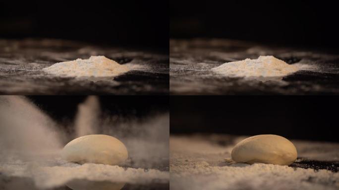 面团掉落在面粉上实拍素材
