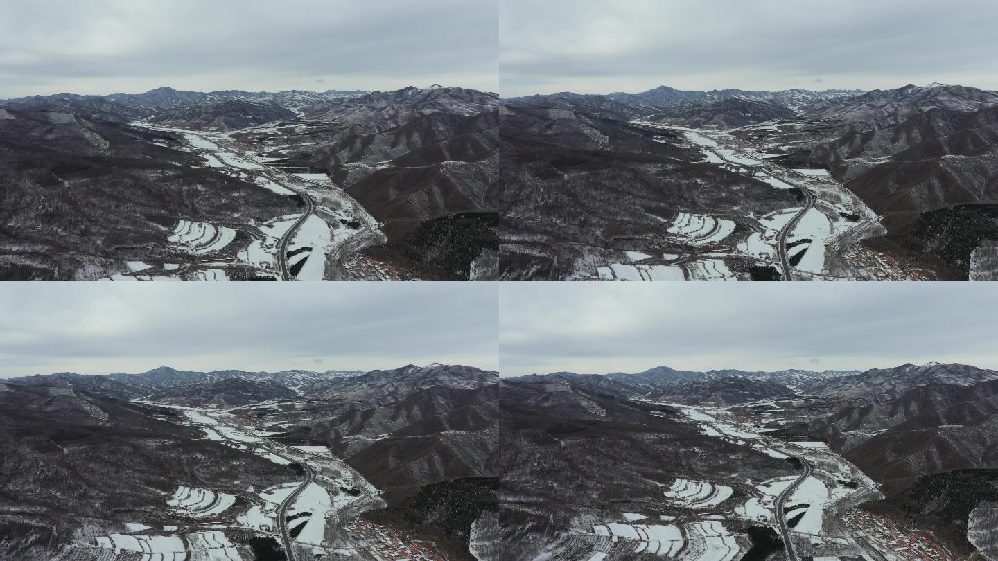 航拍中国北方雪后雪景山景梯田