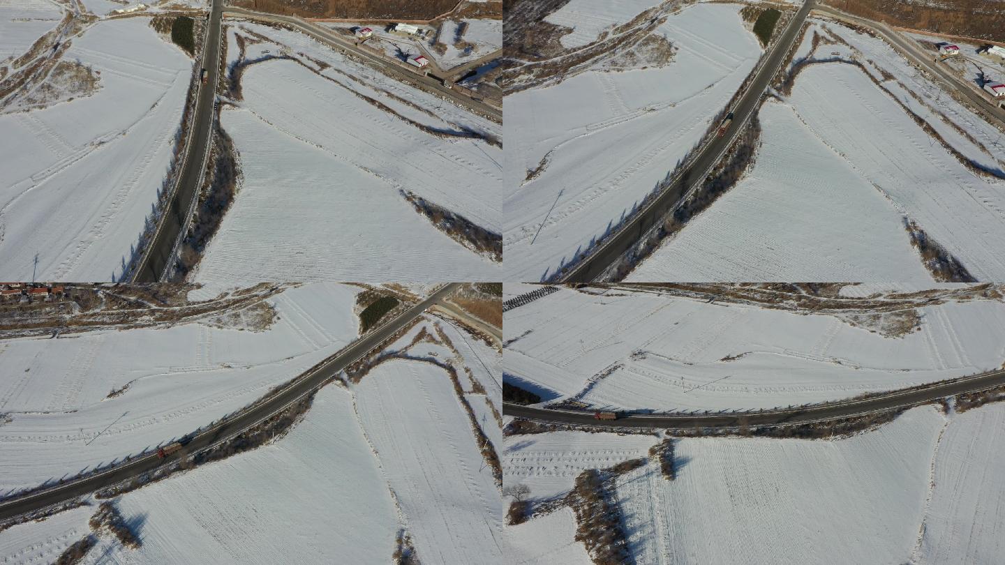 航拍北方雪后汽车在公路上行驶，大好河山