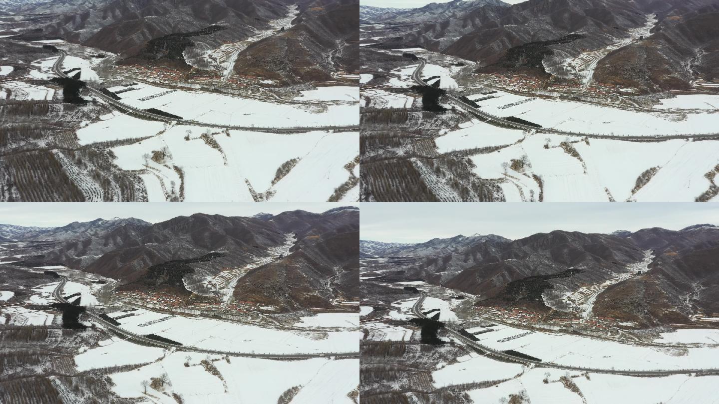 航拍中国北方雪后雪景山景村庄