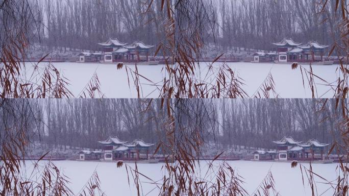 下雪天湖面冰雪古亭慢动作