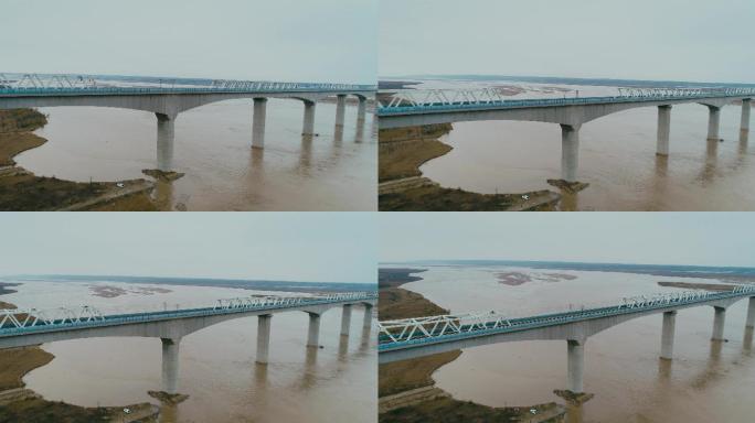4K航拍冬天的黄河高铁桥