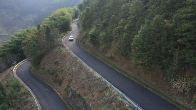 航拍汽车行驶在盘山公路多角度4K