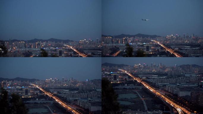 夜空飞机飞过城市