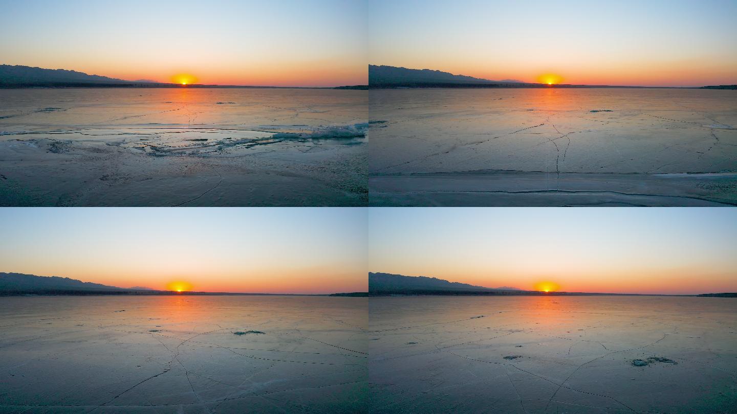 冬季晴天结冰湖面日落夕阳航拍视频