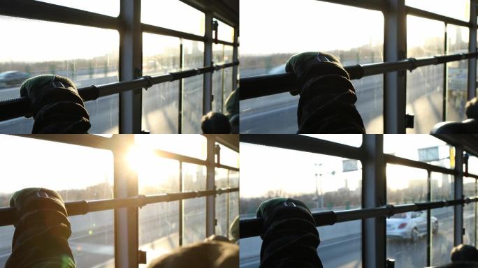 4K冬天坐公交车出行夕阳阳光照进车窗