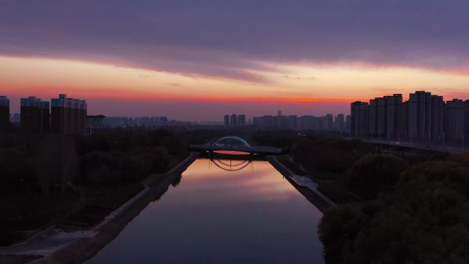 4K航拍实拍河南郑州龙子湖晚霞夜景