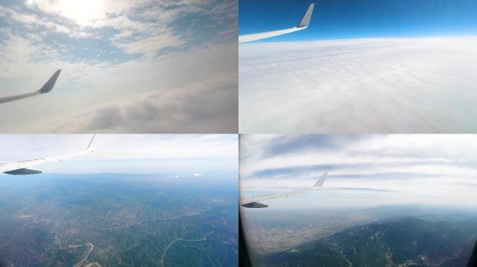 飞机起飞降落窗内视角穿出云层俯瞰空中风景