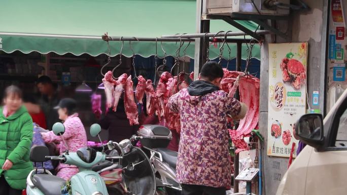菜市场卖猪肉摊贩