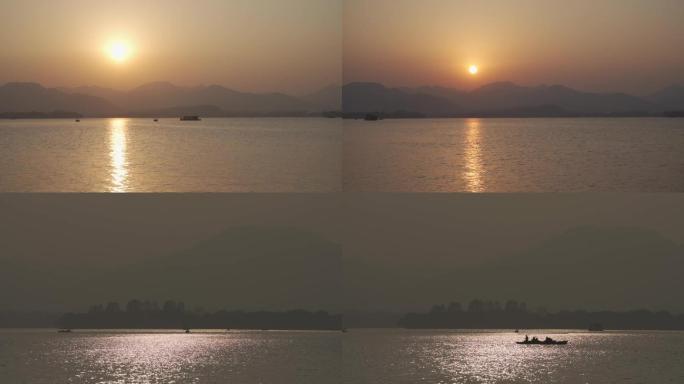 杭州西湖落日摇船的人空镜头