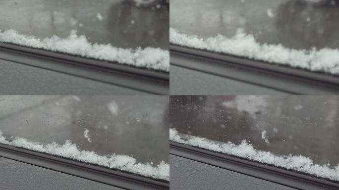 冬天车窗上雪花掉落升格
