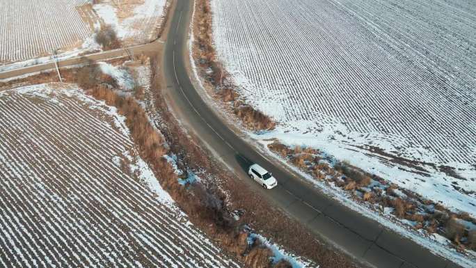 北方冬季冬日下雪汽车车拍航拍