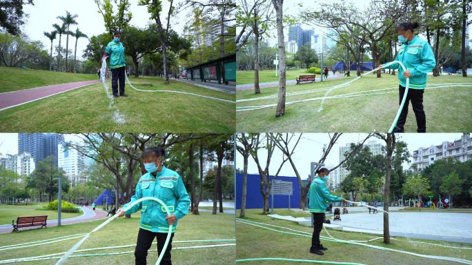 城市公园环卫工人浇水作业