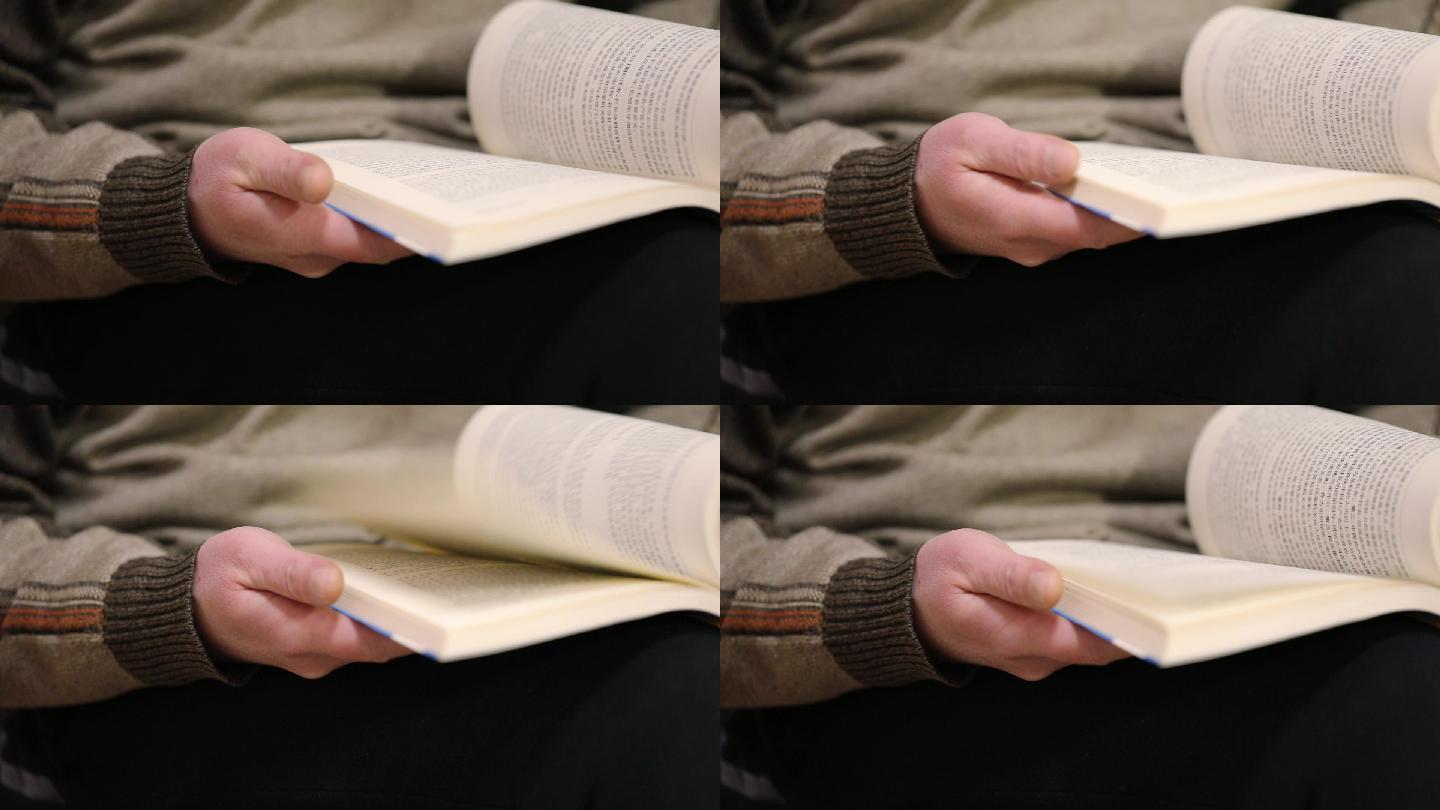 翻看书籍学习文化知识手部动作