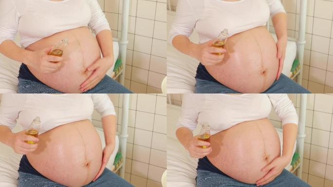 孕妇给怀孕的肚子抹精油防止妊娠纹4k