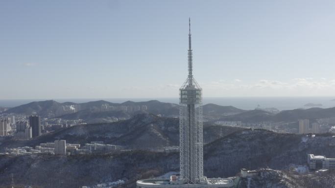 大连市中山区劳动公园雪后航拍彩电塔4k