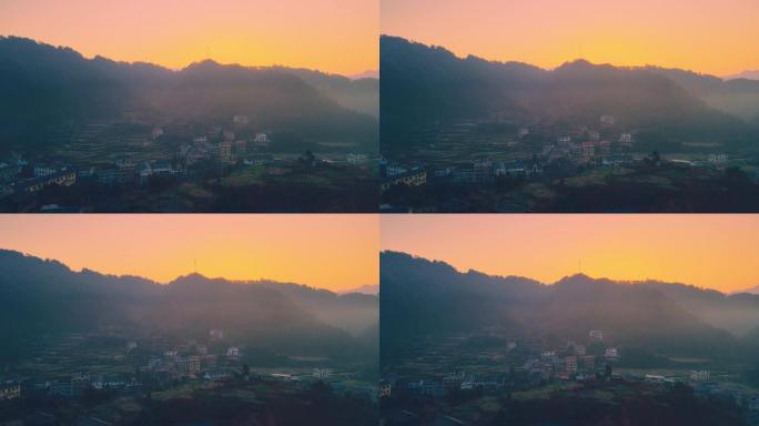 航拍清晨晨曦下的小山村