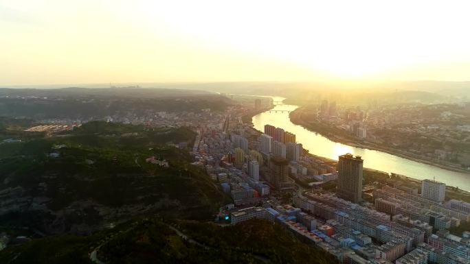 夕阳黄河沿岸城市